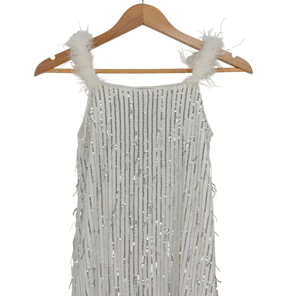 EXARUS Girls White Silver Sequin‎ Fringe Dress Feather Straps Size 14Y Hair Bow
